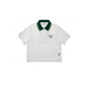 Malbon women golf polo shirt in white front view