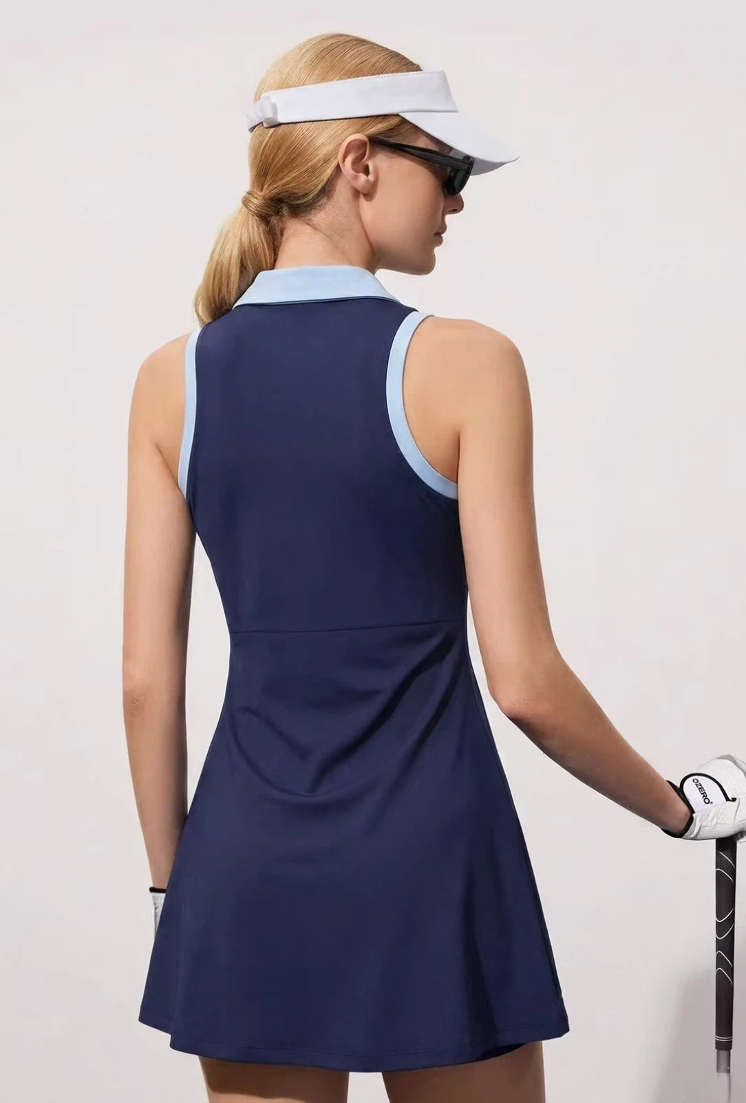OZERO Navy pleated golf dress rear view on model