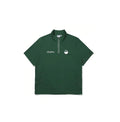 Malbon Unisex Quarter-Zip Golf Polo Shirt in green — back view with cursive Malbon embroidery