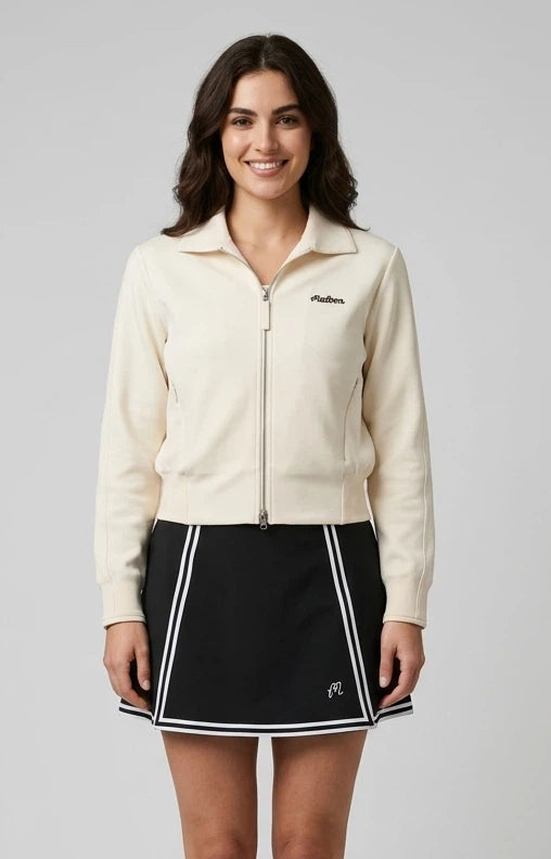 Malbon women's golf skort with built-in shorts — fabric texture close-up