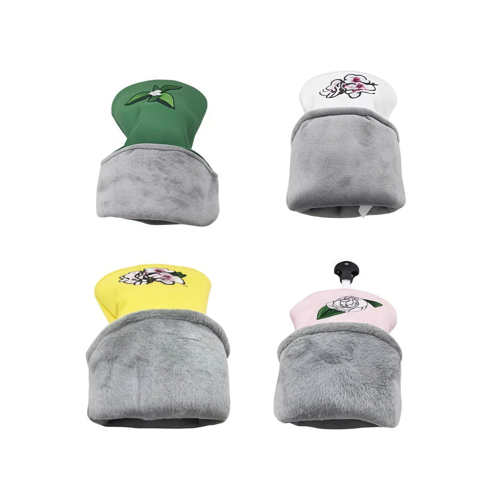GURUISI floral golf headcover set in four colors: green, white, pink, and yellow — each with embroidered cherry blossom and rose design, magnetic closure, and plush gray interior lining for premium protection and easy identification.