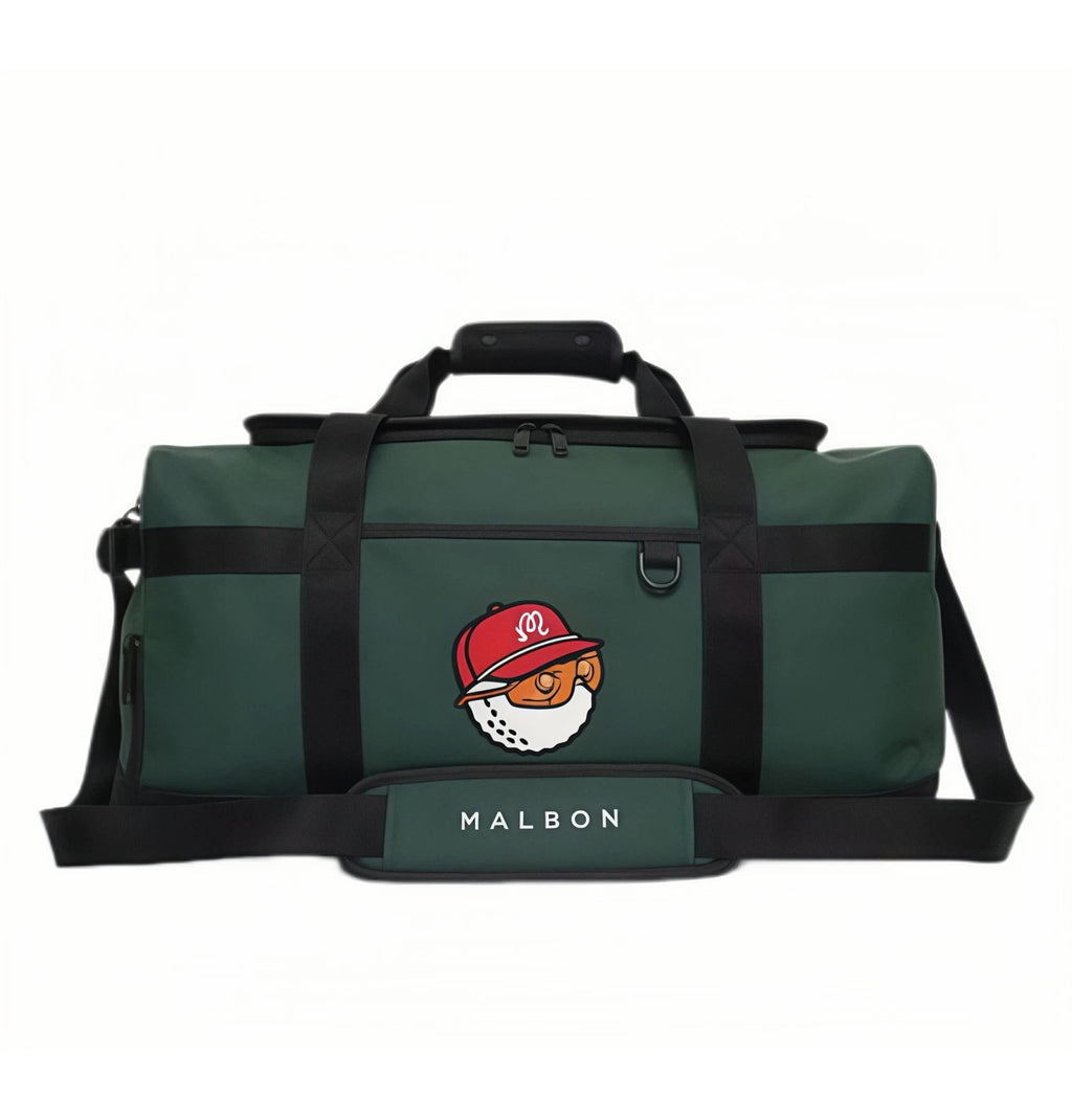 Full front view of Malbon Golf "Buckets" duffle bag in deep green fabric with black straps, showcasing embroidered golf ball mascot with red cap and "MALBON" text panel