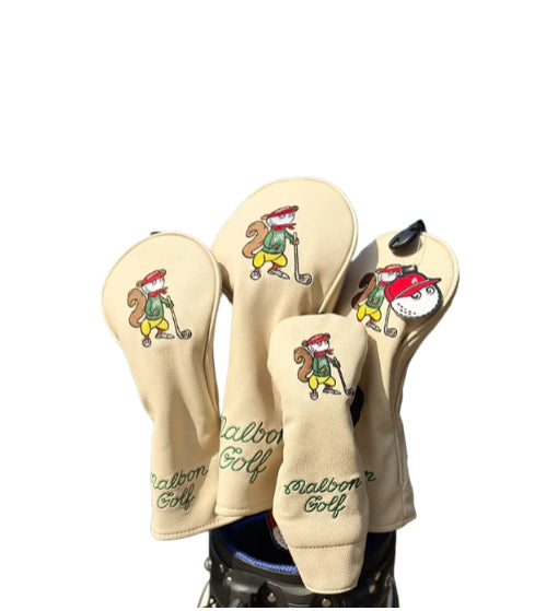 Set of beige Malbon Golf headcovers with cute squirrel illustrations and "Malbon Golf" script embroidery — premium waterproof PU material with magnetic closure for secure fit and easy access.