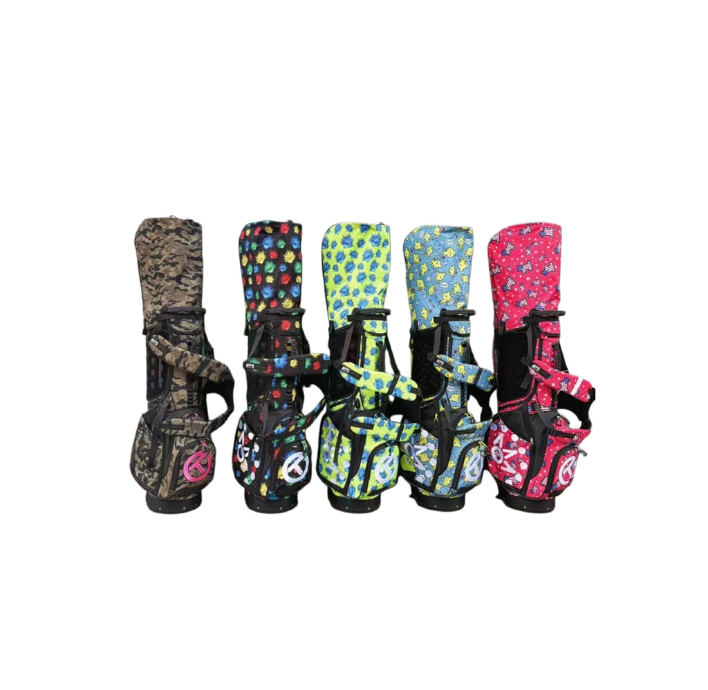  A side profile view of five Scotty Cameron Junior golf bags lined up. This image displays the varying patterns and the dual-strap system on the Camo-Pink, Pineapple, and other exclusive prints.