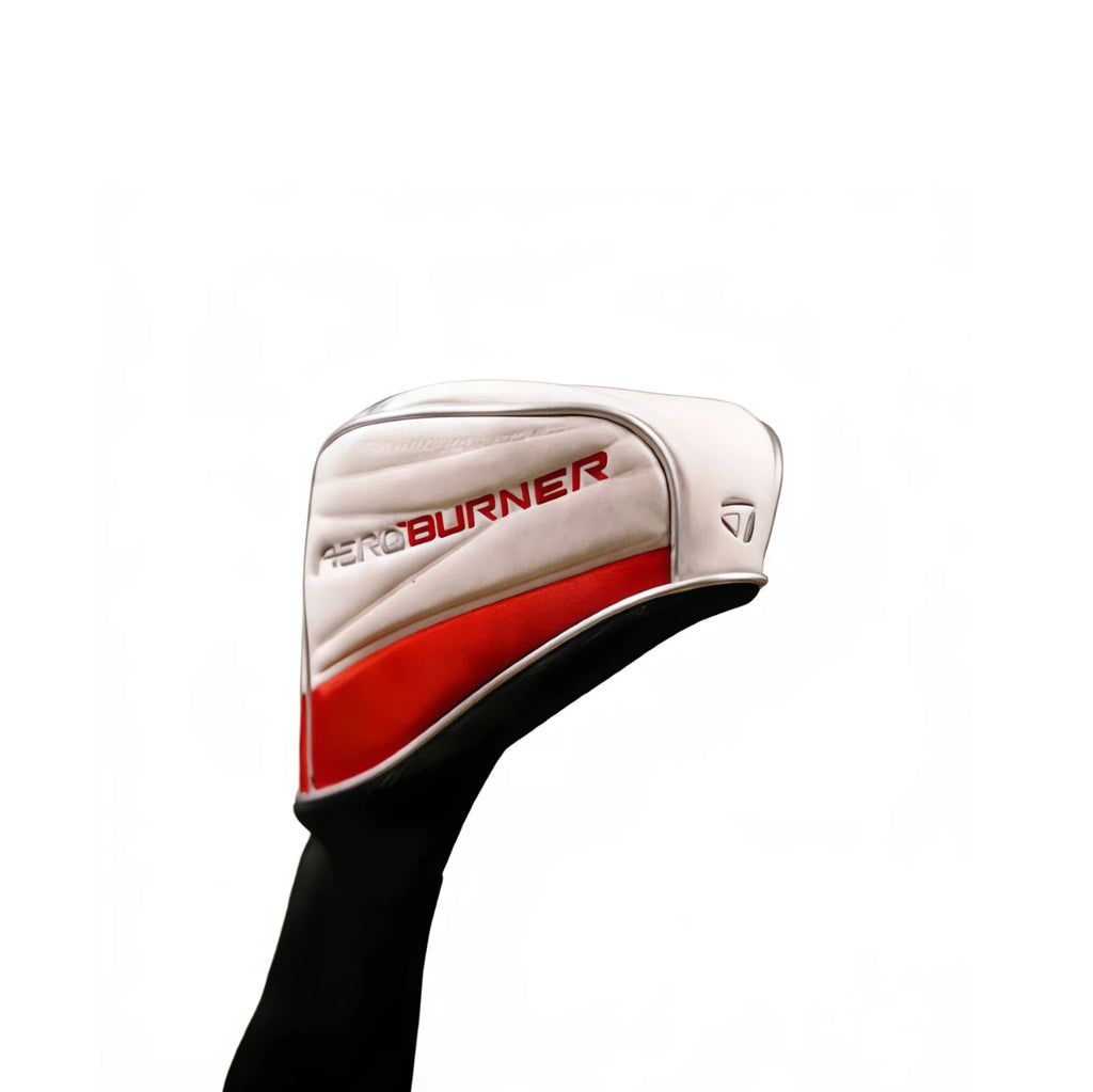 Side view of TaylorMade AeroBurner driver headcover featuring white synthetic leather, red "AEROBURNER" text, and signature TaylorMade logo — built for performance-inspired style and club protection.