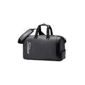 Dark gray Titleist Golf Boston Travel Bag with subtle sheen, white logo, and durable construction. Includes dual handles and padded shoulder strap for comfortable transport.