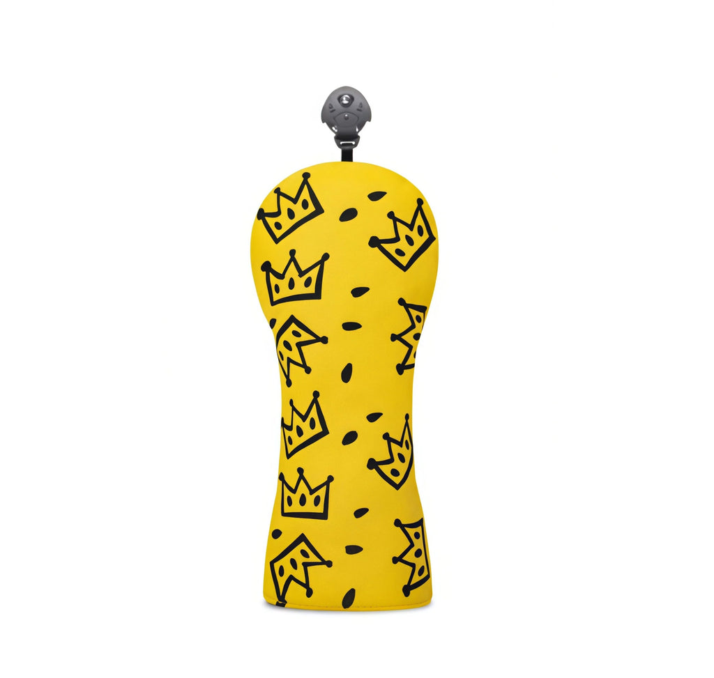 Side view of yellow Waac golf headcover with black plastic hook attachment at top; crown pattern evenly distributed, suitable for hanging or attaching to golf bag.