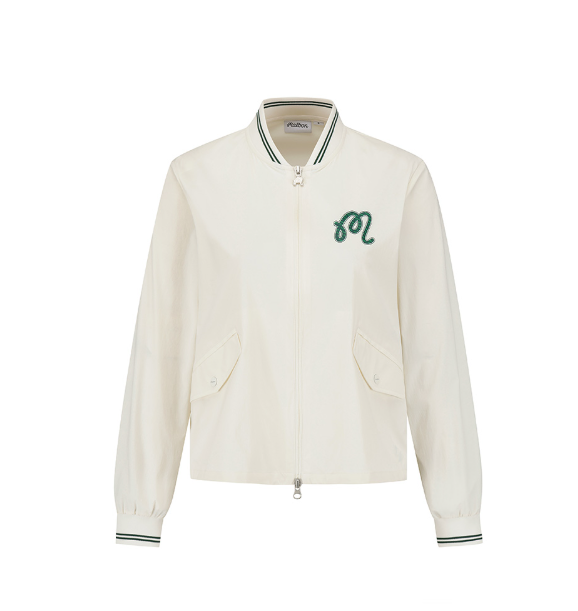 Malbon women's stand collar lightweight breathable golf jacket in White, lifestyle view