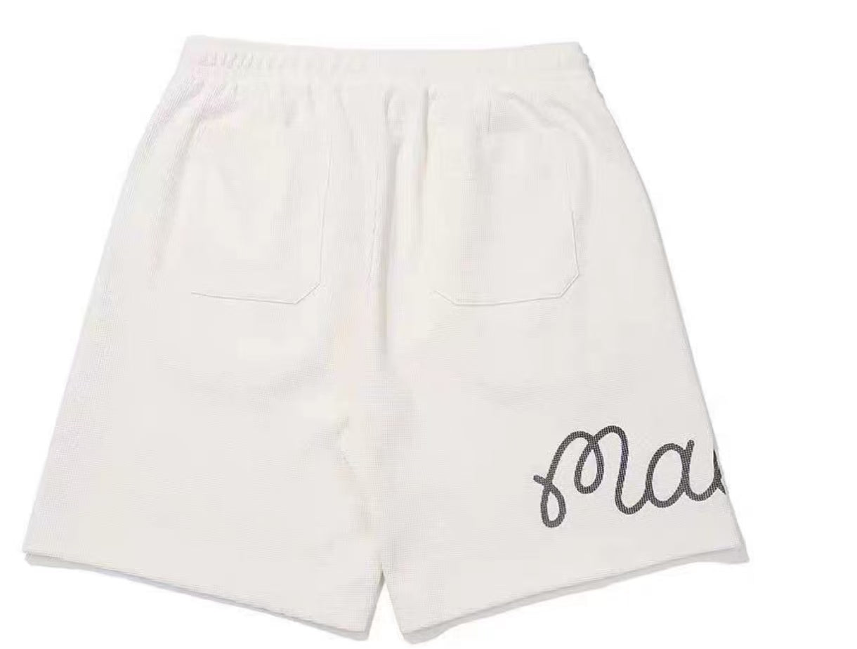 Malbon men's elastic-waist quick-dry golf shorts in White - front view